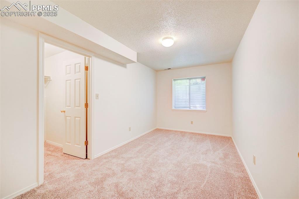 Image 34 of 45: Basement 5th bedroom