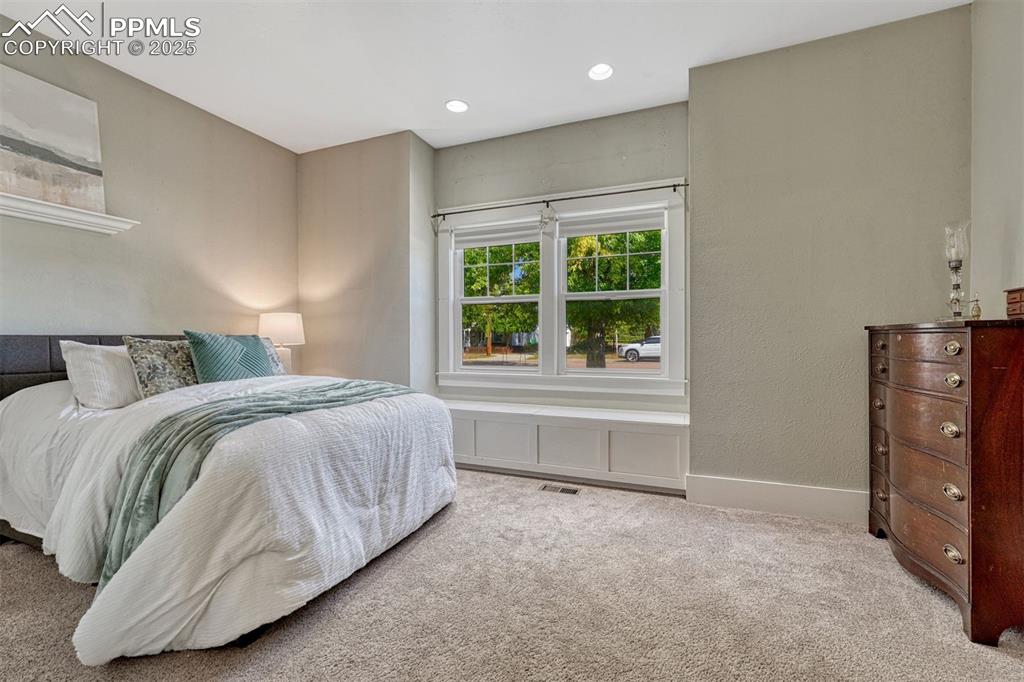 Image 15 of 42: main level bedroom