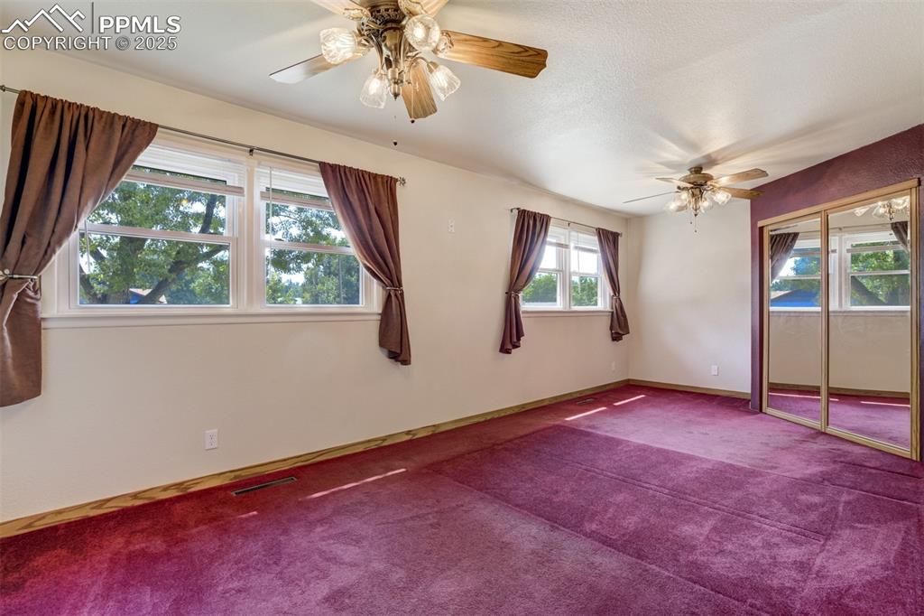 Image 19 of 50: There is hardwood under the carpet! 