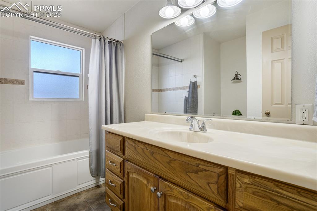 Image 23 of 50: Main level full bathroom