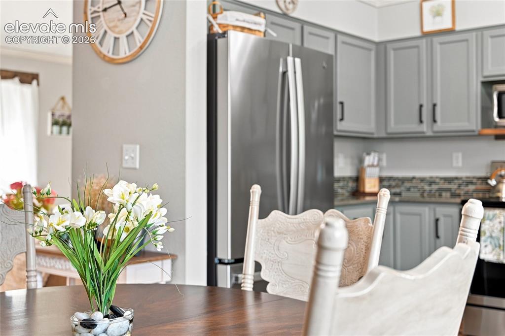 Image 11 of 45: Kitchen and dining area