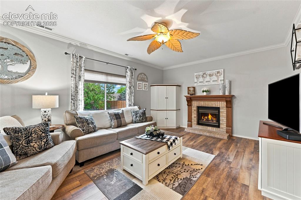 Image 17 of 45: Family room with gas fireplace