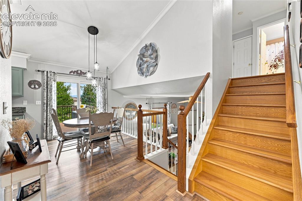 Image 8 of 45: Spacious dining area with walkout to deck