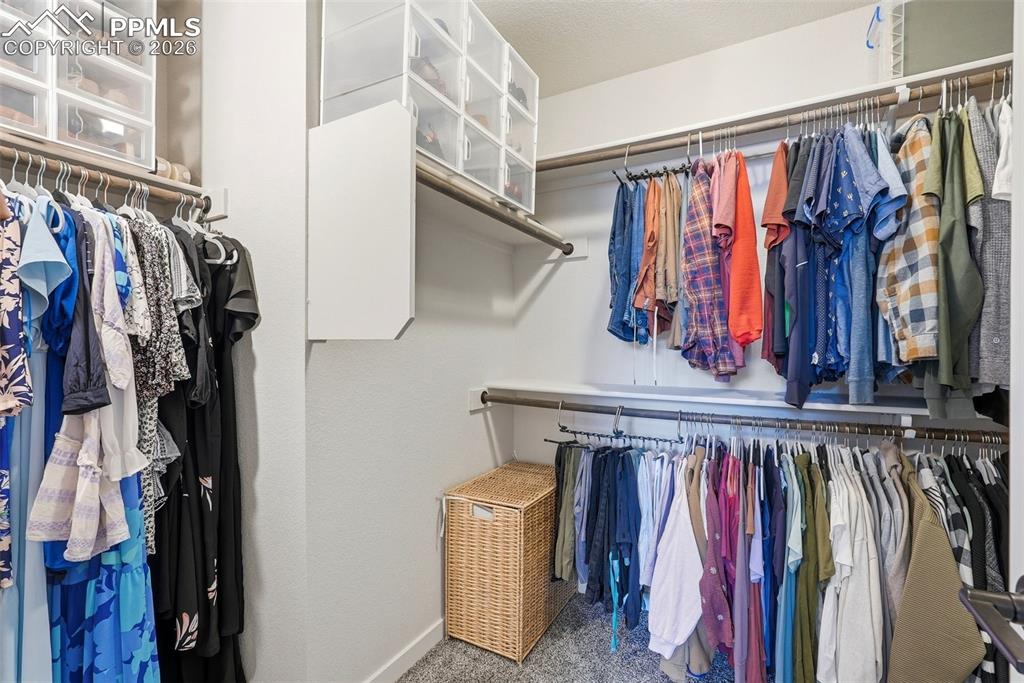 Image 31 of 49: Primary Closet