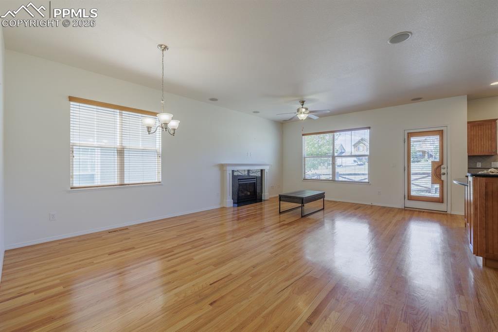 Image 11 of 50: Wood-finish flooring throughout the main level