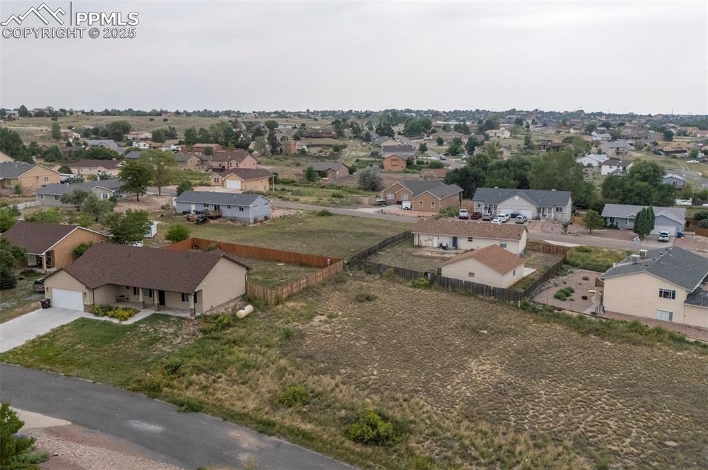 Image 2 of 11: View of property location featuring nearby suburban area