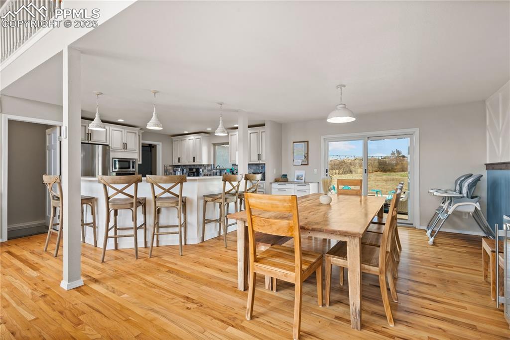 Image 10 of 48: Beautifully remodeled kitchen with window overlooking the backyard.