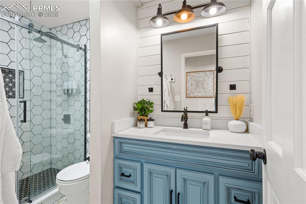 Image 24 of 48: Beautiful walk-in shower in main level bathroom