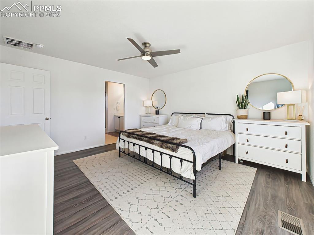 Image 29 of 50: Clean and calming design with space for a full bedroom set and access to th