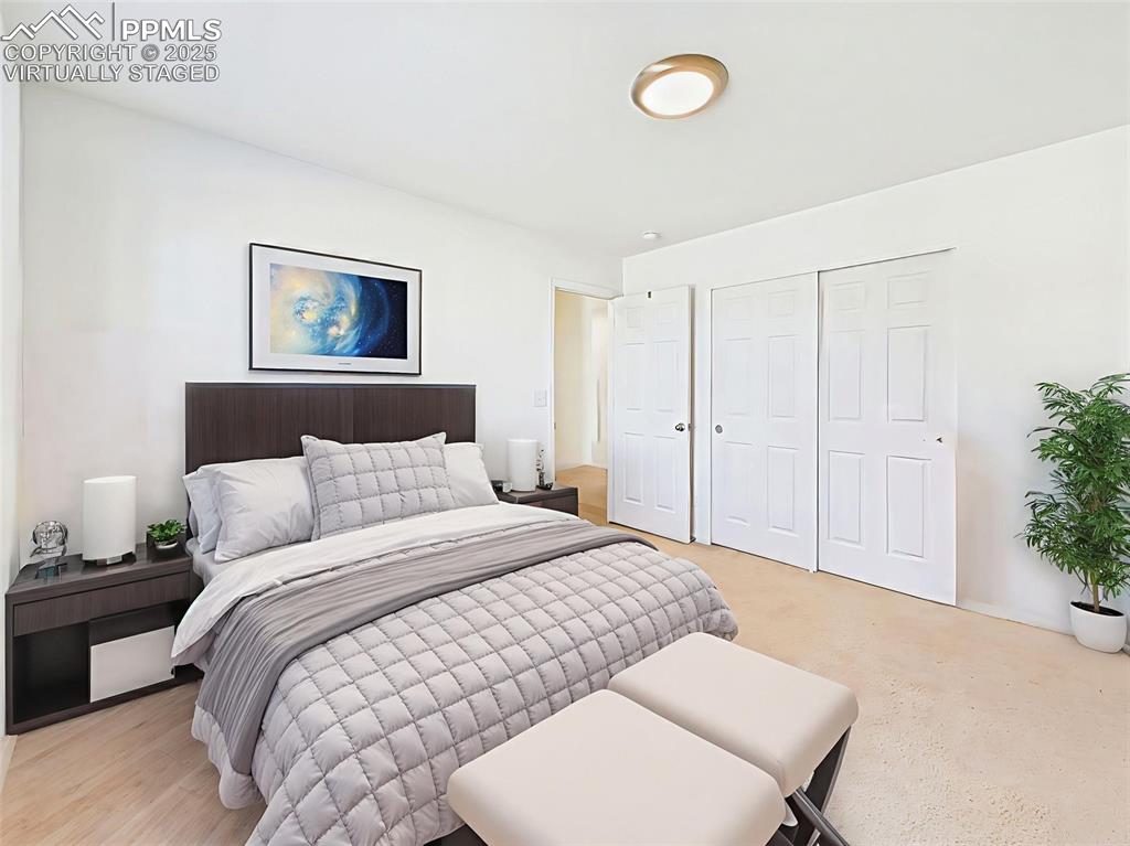 Image 36 of 50: Virtually staged for inspiration — this secondary bedroom features a full d