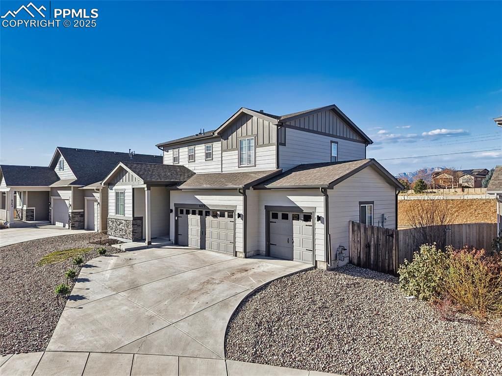 Image 41 of 50: Charming two-story with crisp Elevation A design, featuring a full 3-car ga