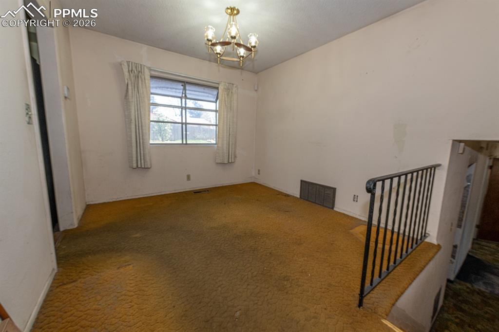Image 10 of 41: Dining area off kitchen