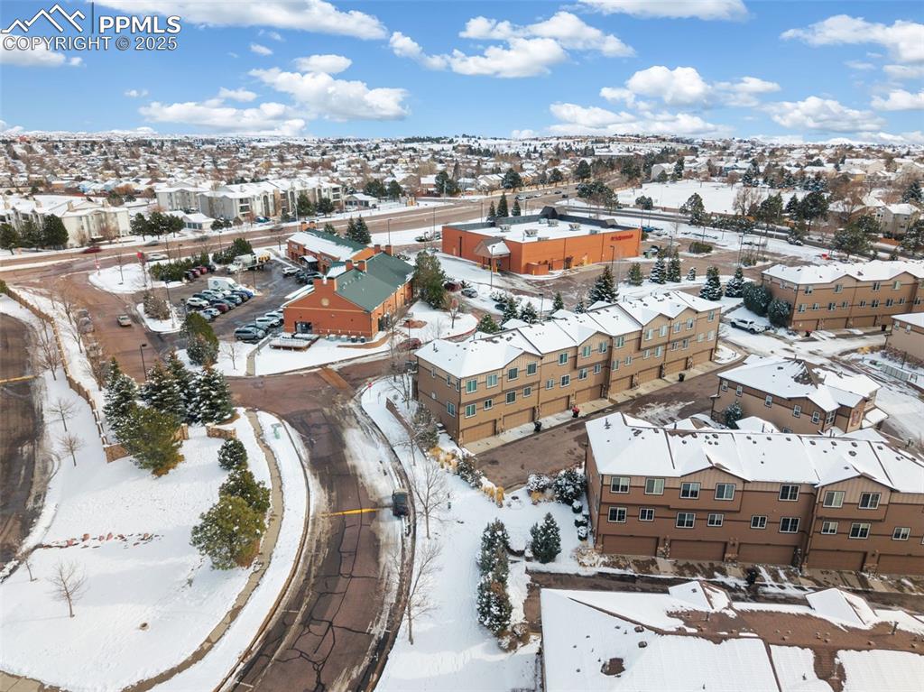 Image 28 of 30: Shopping, dining and a fitness center are a quick walk from your front door