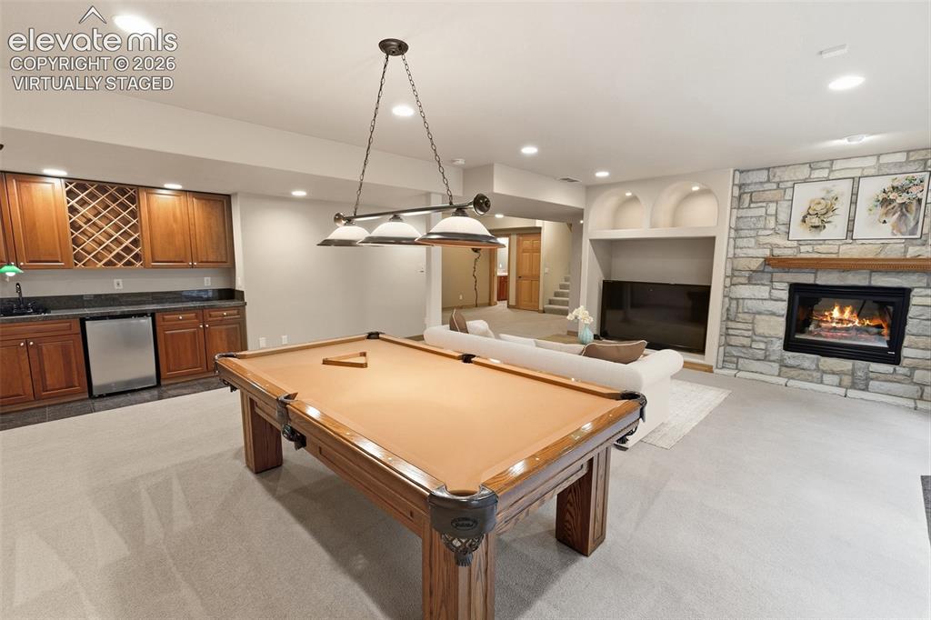 Image 23 of 47: Lower Level Family Room - Virtually Staged