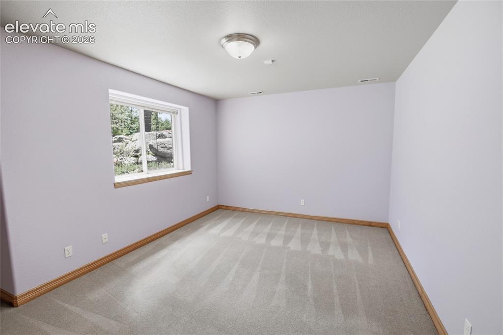 Image 44 of 47: Lower Level Family Room