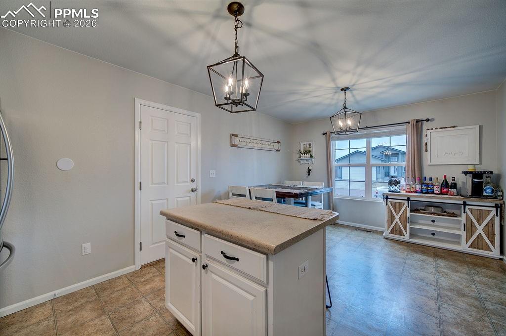 Image 14 of 48: View of the Dining Area from the Kitchen.