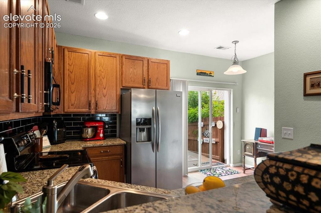 Image 12 of 39: Kitchen