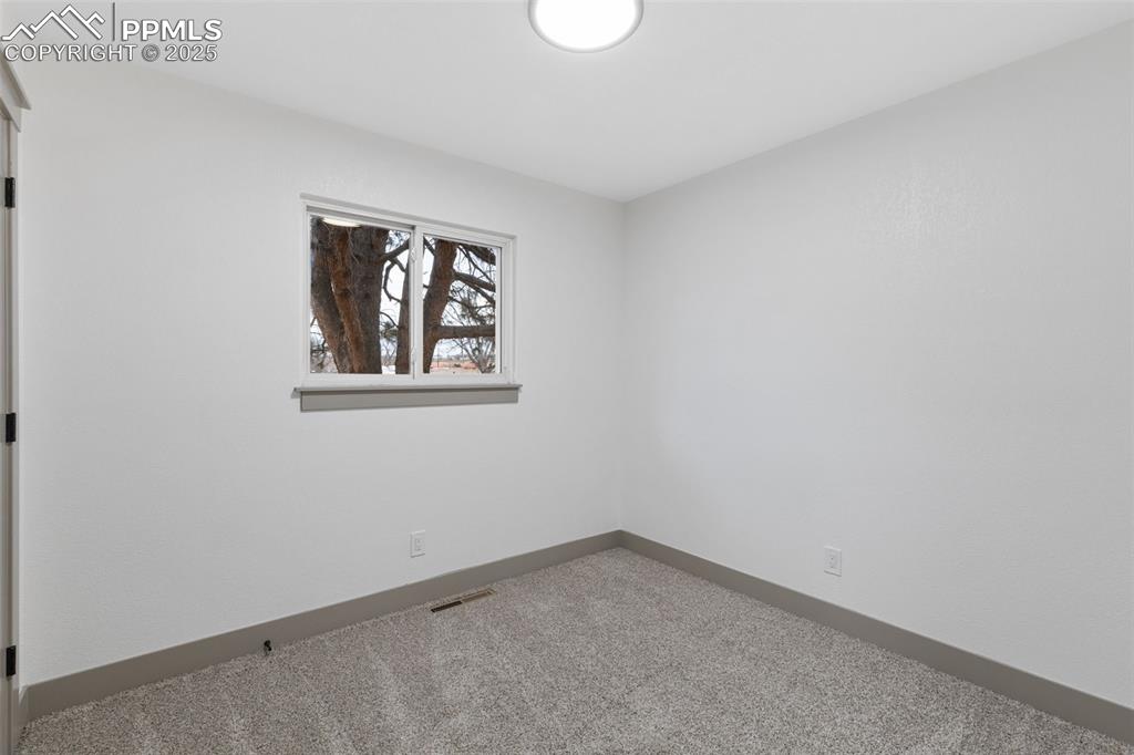 Image 22 of 36: Bedroom