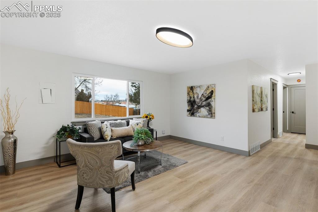 Image 4 of 36: Bright, open living space makeover.