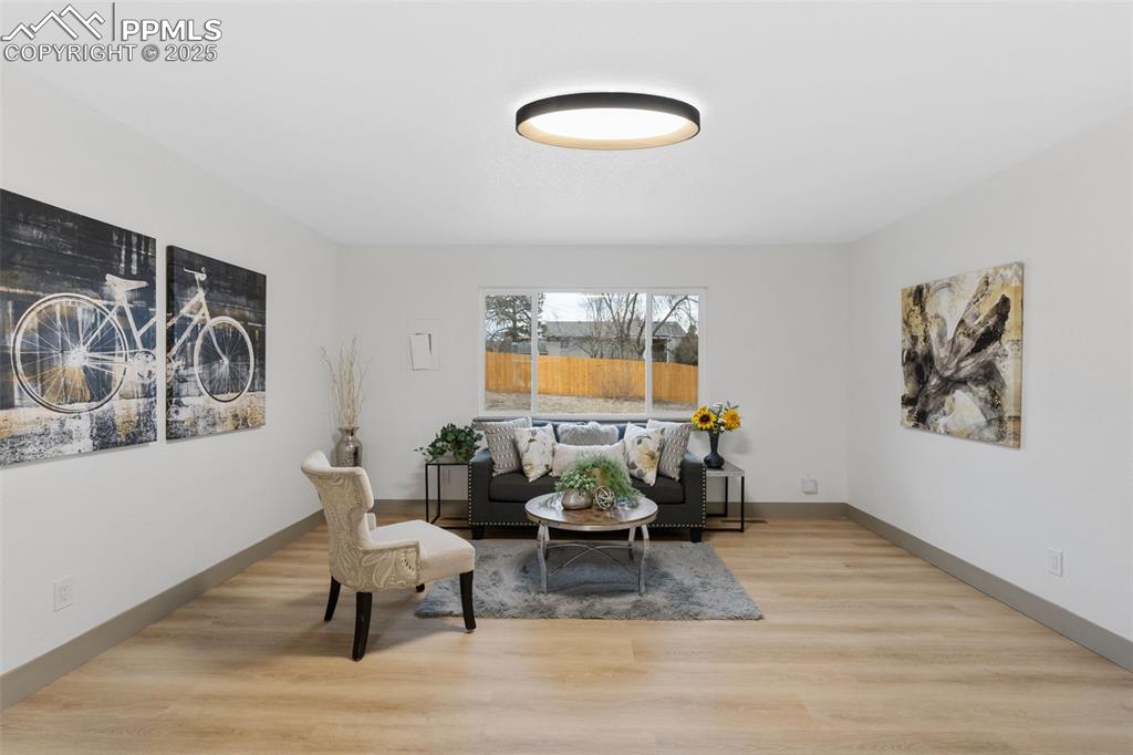 Image 5 of 36: Cozy living room with natural light.