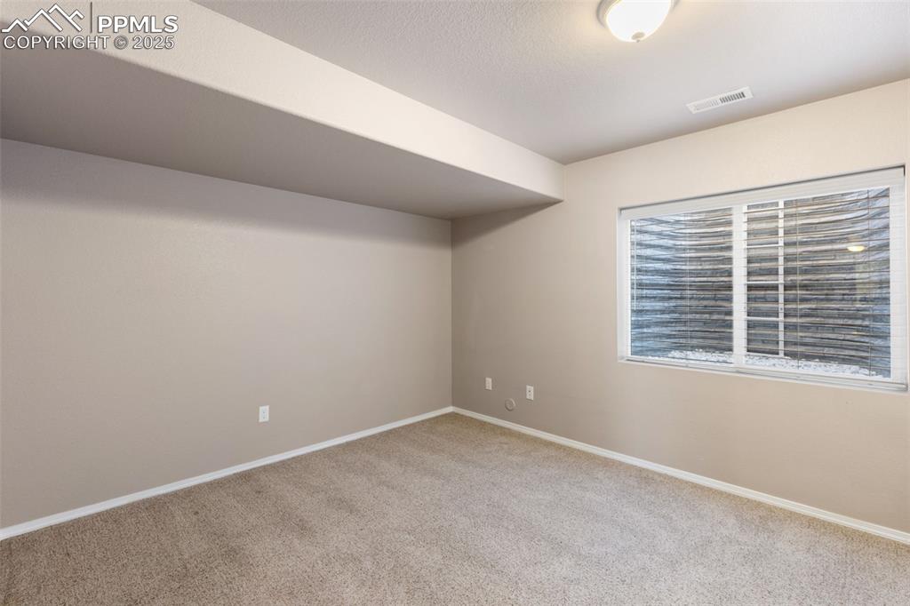 Image 31 of 43: Basement Bedroom