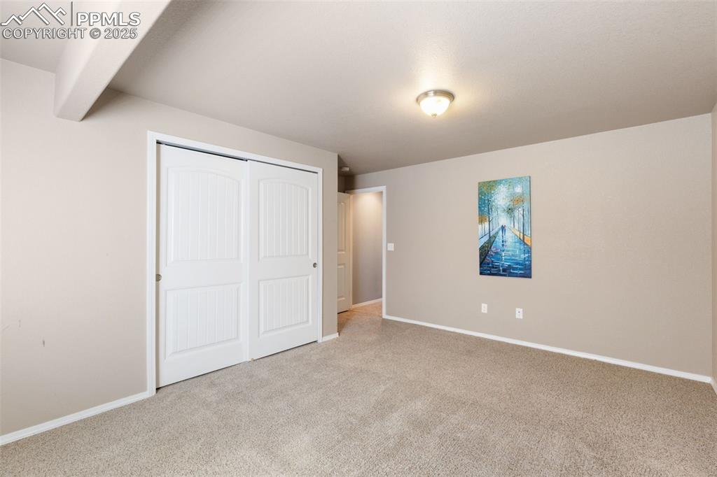 Image 33 of 43: Basement Bedroom