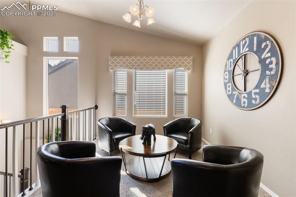 Image 8 of 43: Formal Dining Room currently used as a seating area