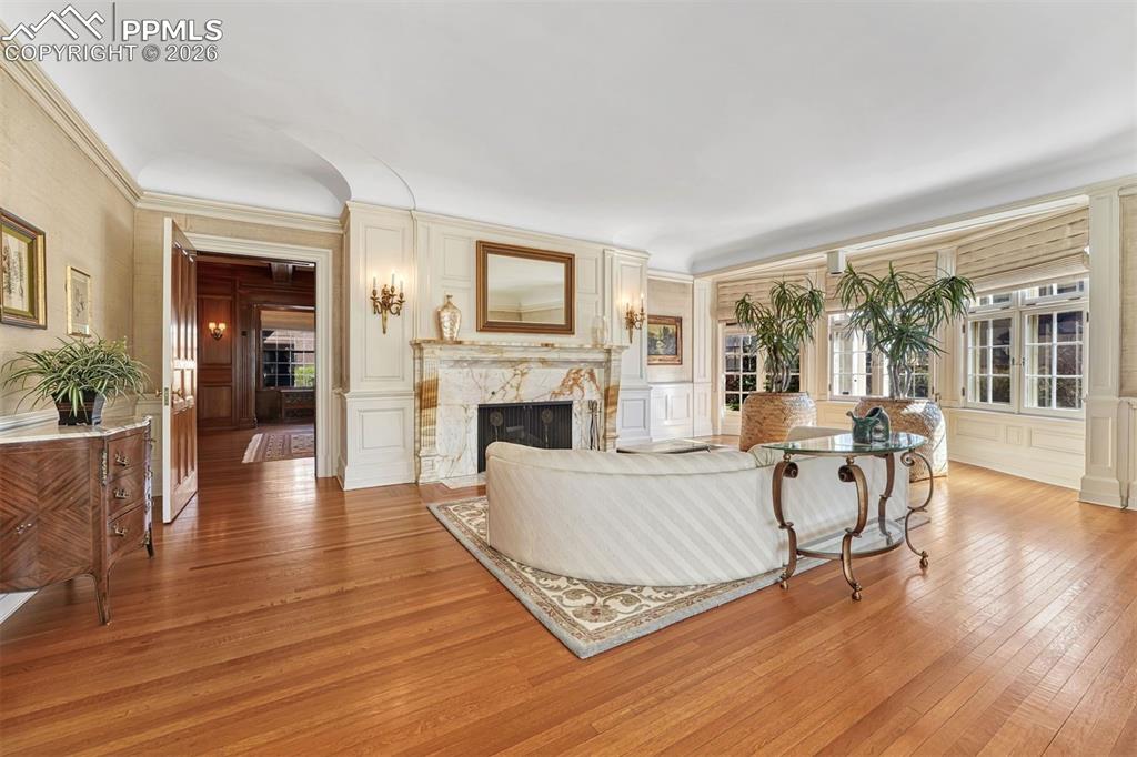 Image 11 of 50: Primary bedroom with fireplace