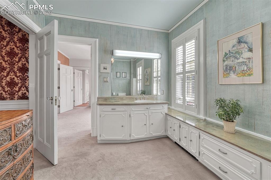 Image 34 of 50: 2nd level living room with deck