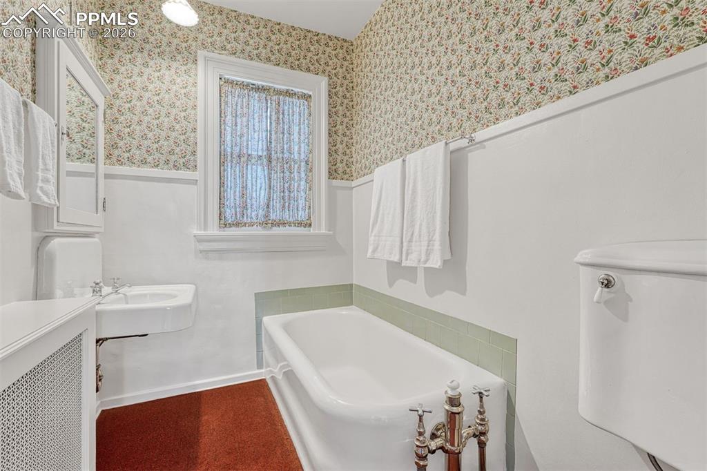 Image 37 of 50: Sitting room off the primary bedroom