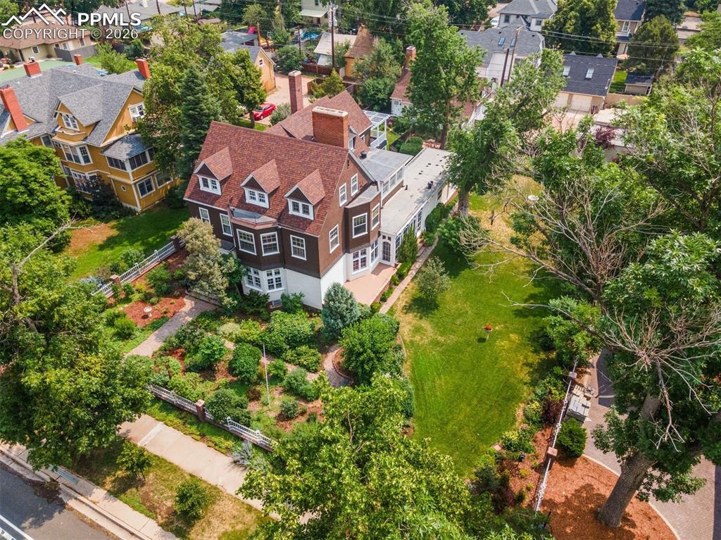 Image 7 of 50: Formal dining room with fireplace