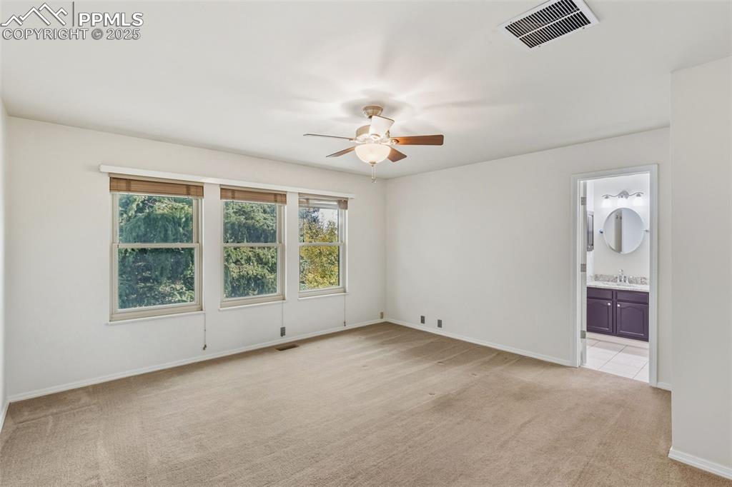 Image 23 of 50: Master Bedroom