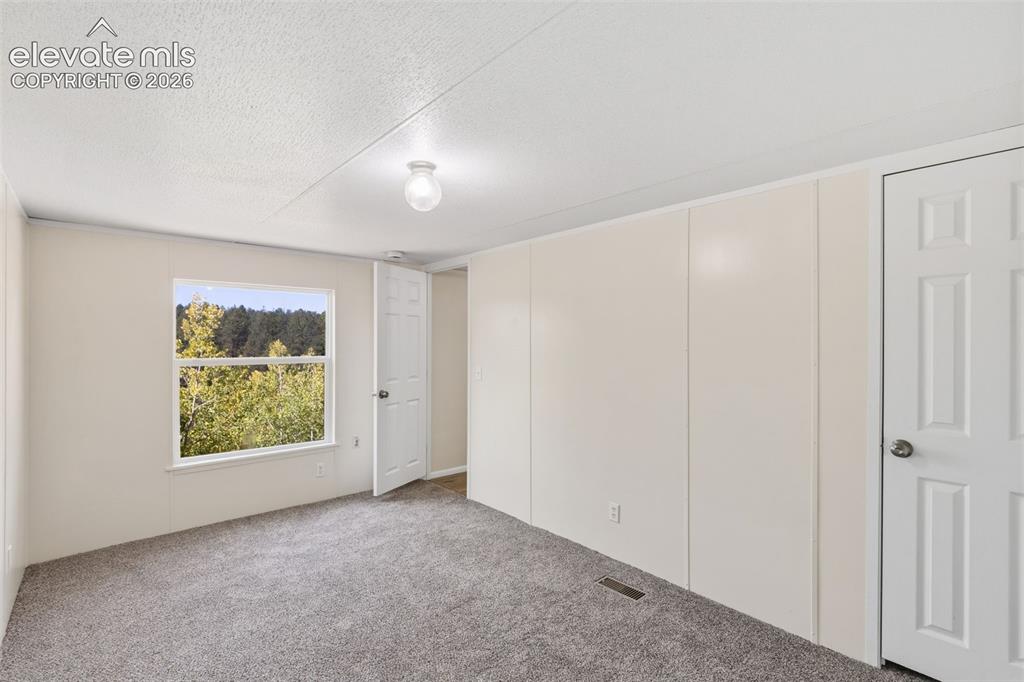 Image 18 of 28: Bedroom