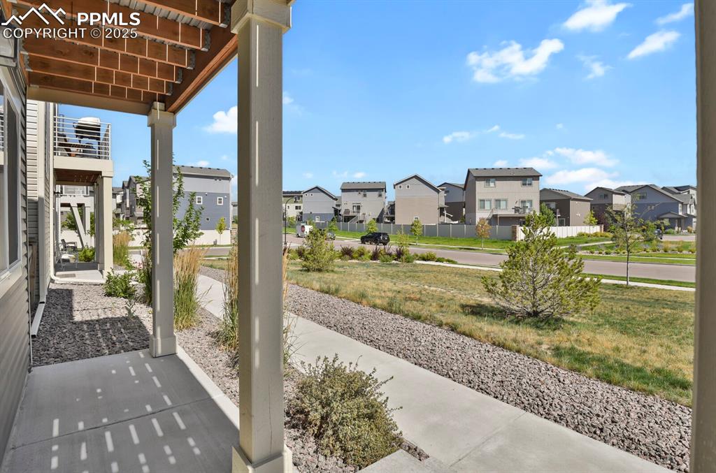 Image 19 of 24: View of patio with a residential view