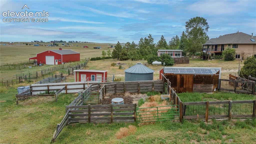 Image 37 of 46: acreage with Barns