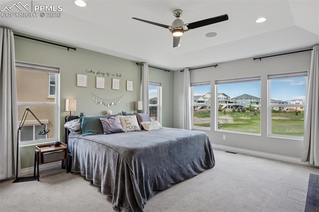 Image 19 of 46: Carpeted bedroom with baseboards, recessed lighting, and a ceiling fan