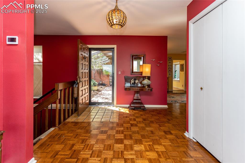 Image 2 of 46: Entryway with baseboards
