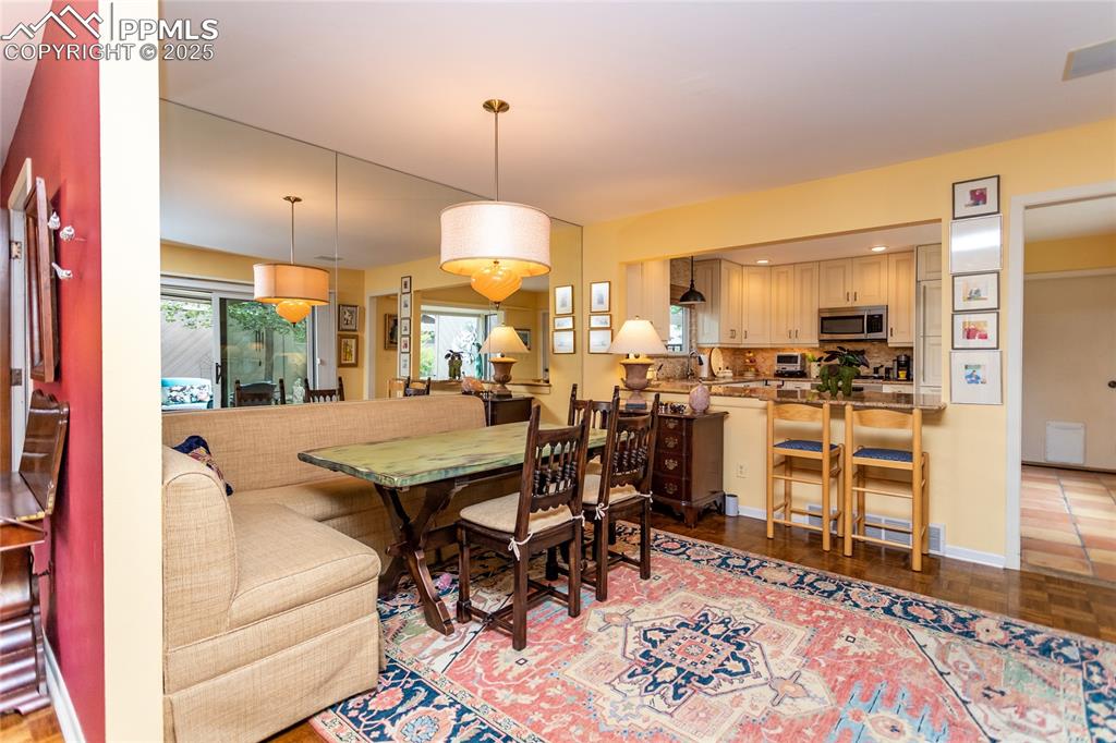 Image 30 of 46: Dining space off of the kitchen