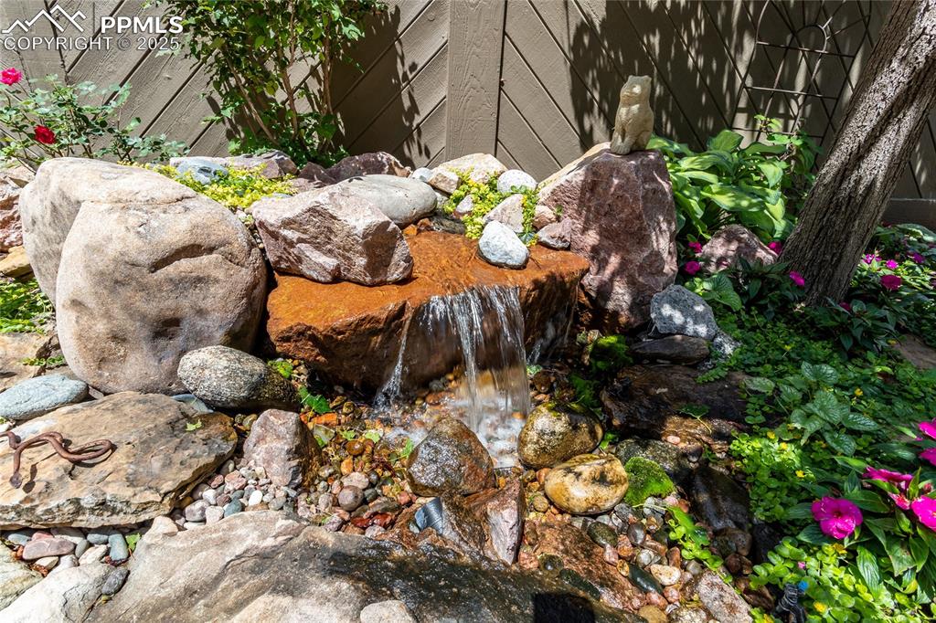 Image 34 of 46: Exterior view with water feature