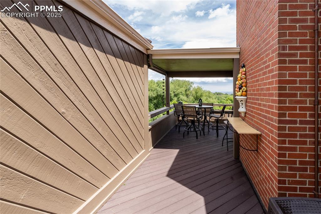 Image 38 of 46: Deck featuring outdoor dining space