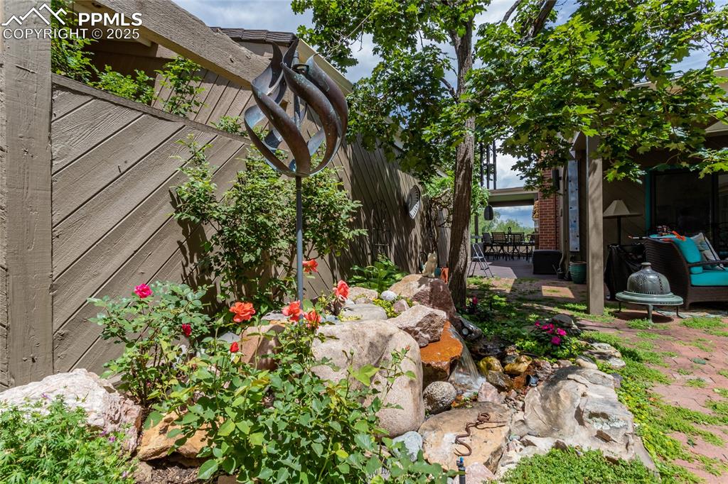 Image 39 of 46: View of yard with a patio