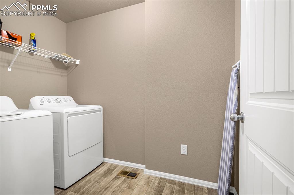 Image 13 of 19: Laundry room on upper floor