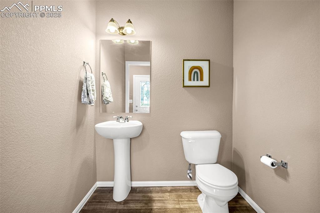 Image 8 of 19: Half bath on main floor