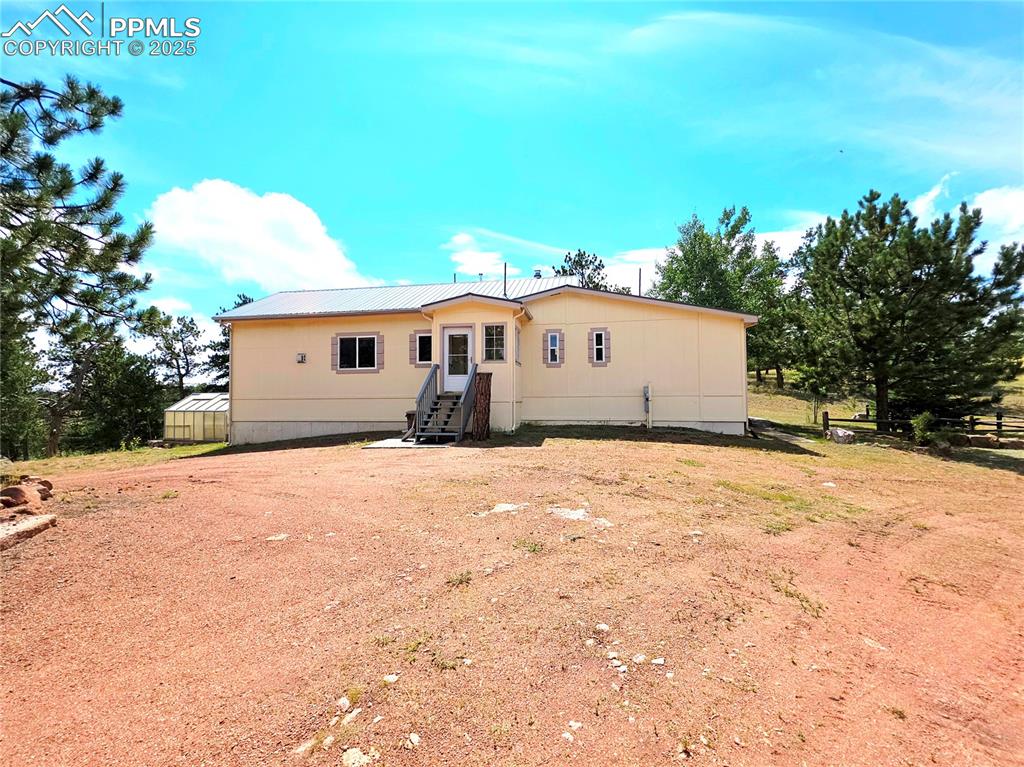 Image 43 of 50: side entry off of circular driveway. Front entry is to the Right, Great roo