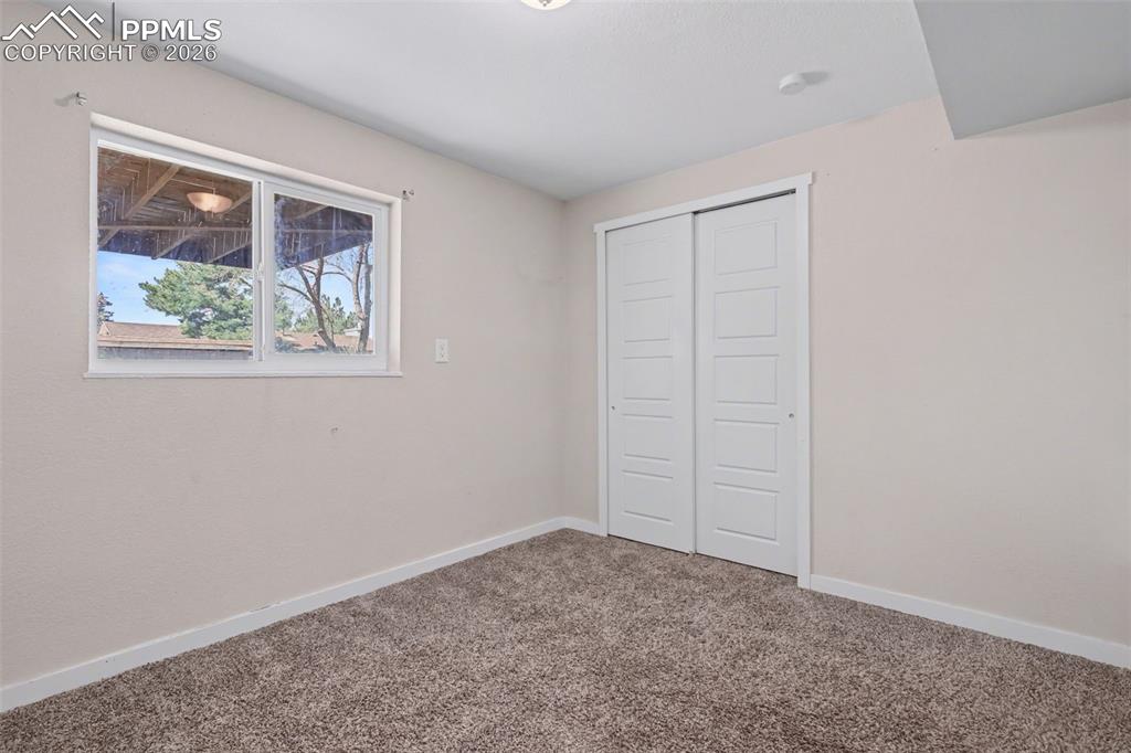 Image 21 of 29: Bedroom