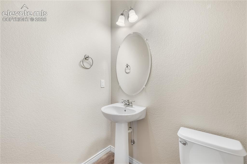 Image 10 of 50: 1/2 bathroom on entry level