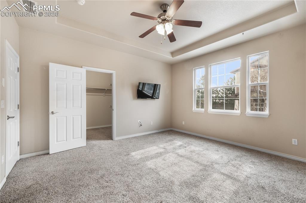 Image 37 of 50: 2nd bedroom with large walk in closet and ensuite 5 piece bathroom