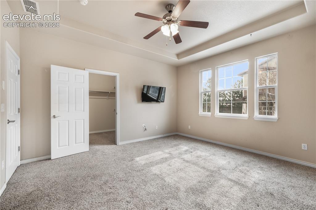 Image 40 of 50: 2nd bedroom with large walk in closet and ensuite 5 piece bathroom