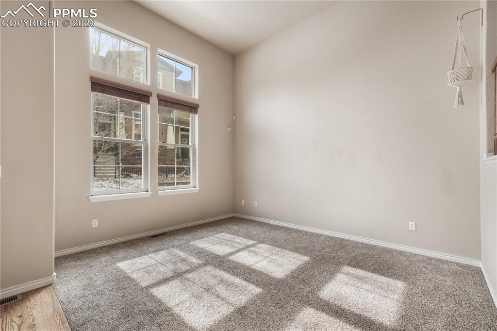 Image 6 of 50: Entry and living room