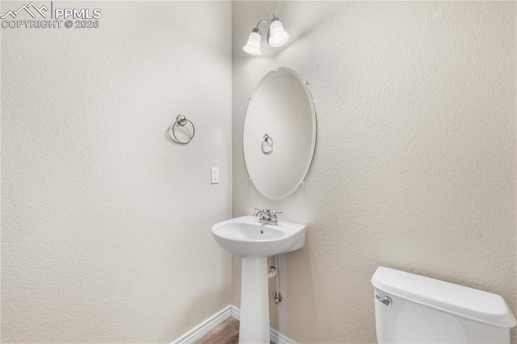 Image 9 of 50: 1/2 bathroom on entry level